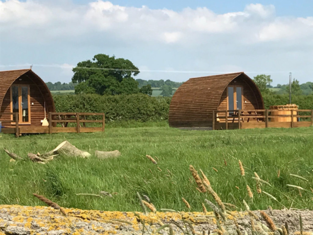 Cosy luxury glamping pods at Evenlode Grounds Farm
