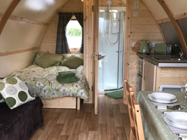 Furnished luxury glamping pod at Evenlode Grounds Farm