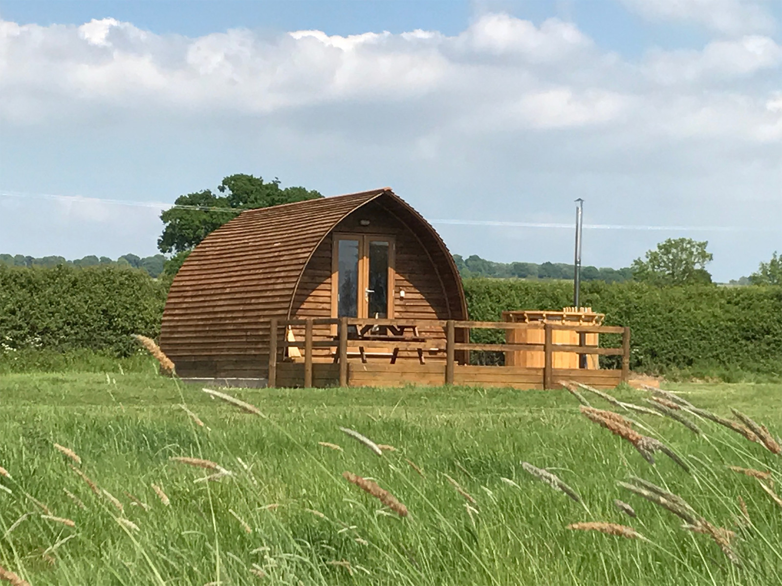 Cosy luxury glamping pods at Evenlode Grounds Farm